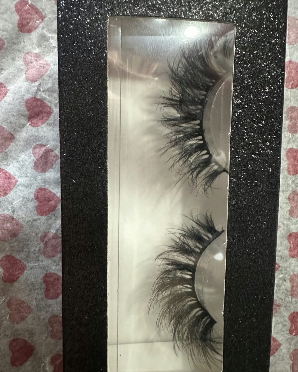 Wispy lash pair in a black glitter window box on pink heart tissue paper